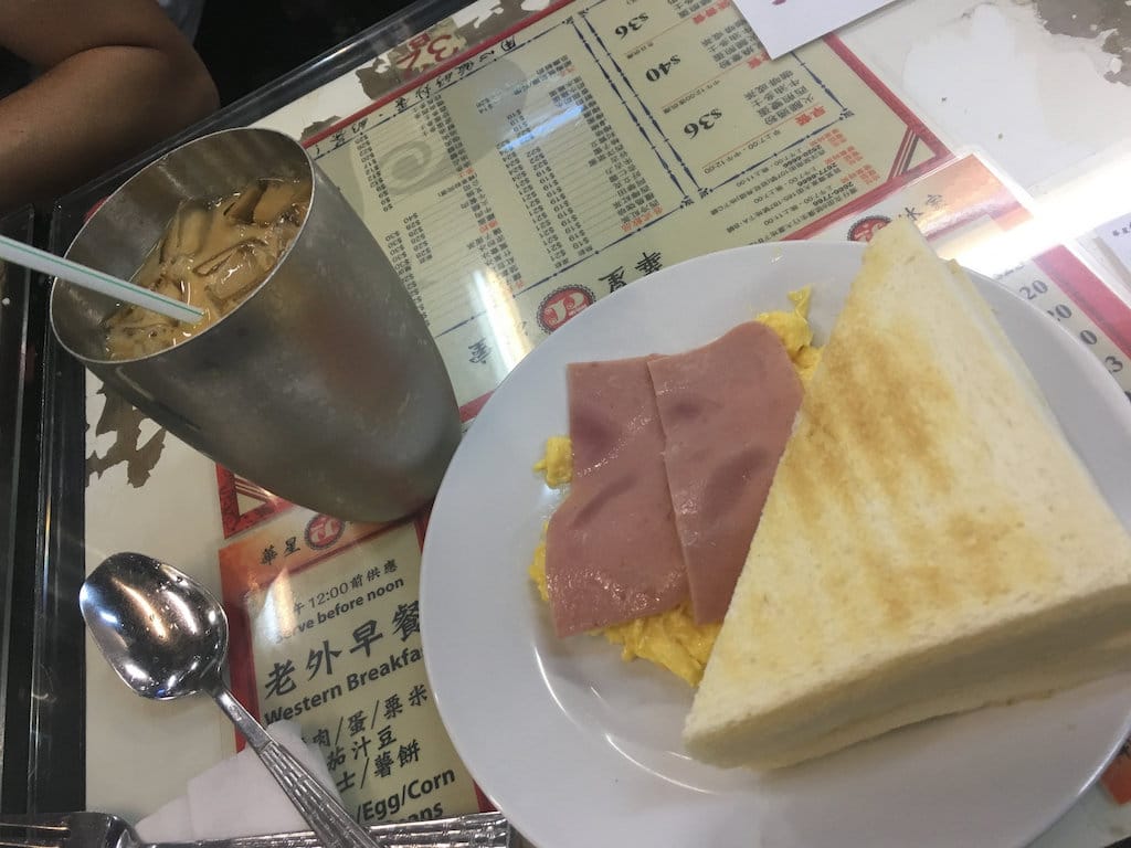 Scrambled egg with ham and toast, and "lai cha", in Hong Kong
