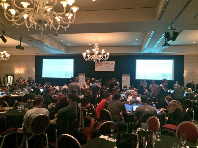 All the people, the stage, the chairs and projectors in EmberConf 2014