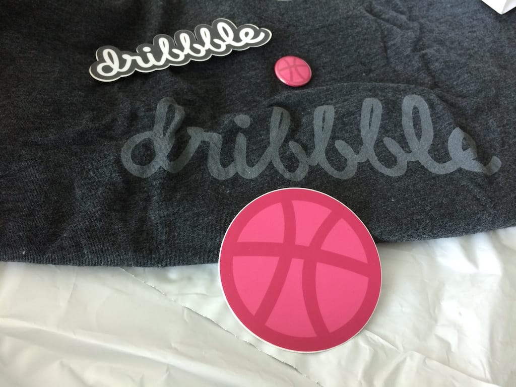 The Dribbble t-shirt, with stickers