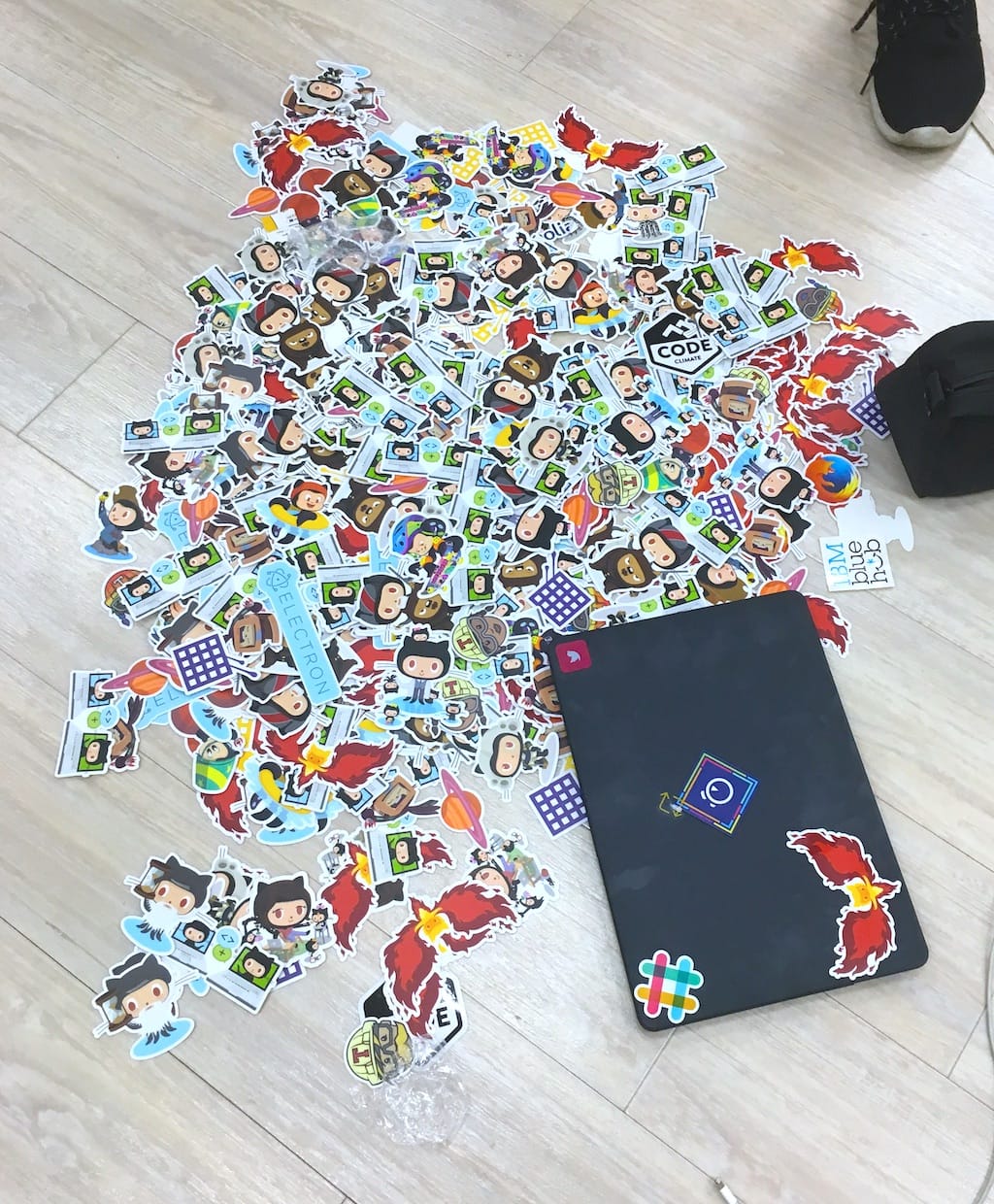 Github (and others) stickers on the floor, at DevRelCon Tokyo 2017