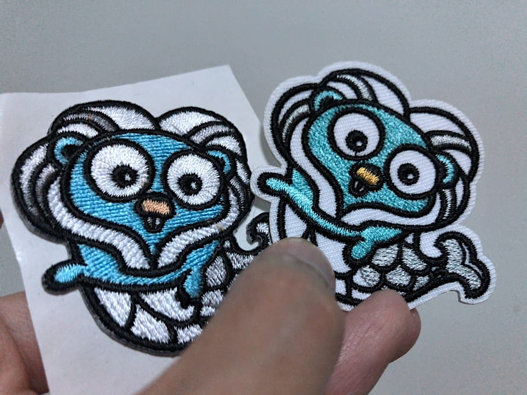 Gophercon Singapore mascot embroidered stickers comparison between two vendors