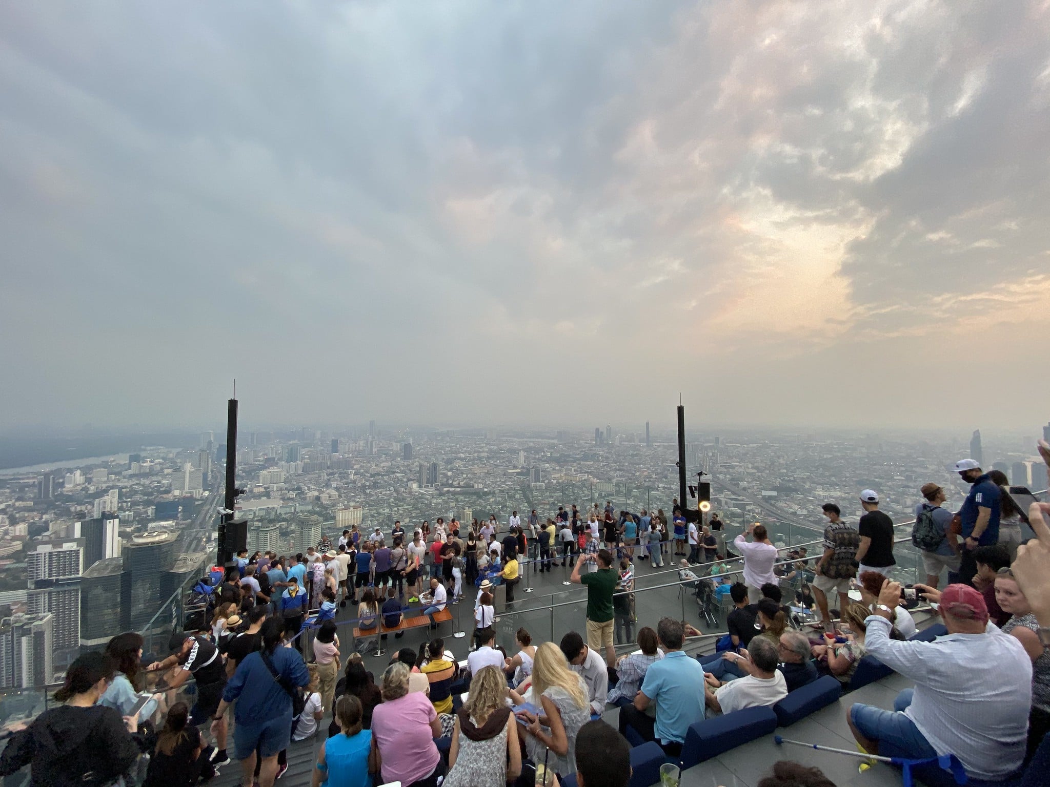 Lots of people at the King Power Mahanakhon SkyWalk, Bangkok, Thailand